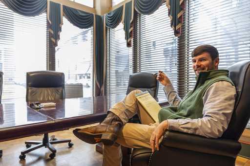 Hunter Garnett, of Garnett Patterson Injury Lawyers, poses at his law office near the Madison Count…