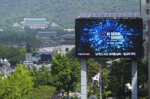 A screen shows an announcement of the AI Seoul Summit in Seoul, South Korea, Tuesday, May 21, 2024