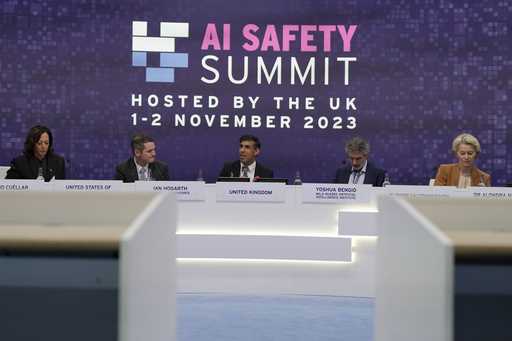 Britain's Prime Minister Rishi Sunk, center, speaks during a plenary session at the AI Safety Summi…