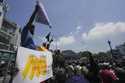 Sri Lankans shout slogans during a protest against the government increasing income tax to manage d…