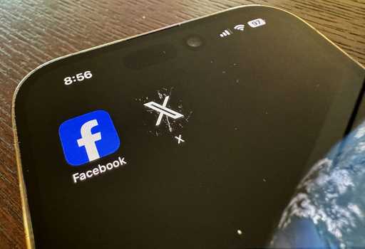 App logos for Facebook, left, and X, formerly known as Twitter, are seen on a mobile phone in Los A…
