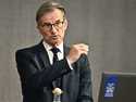Governor of the Riksbank Erik Thedeen gestures during a press conference, in Stockholm, Thursday, S…