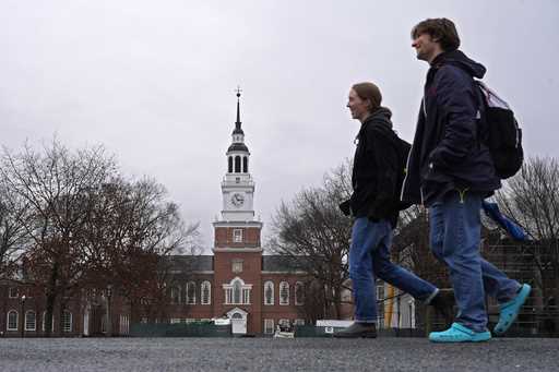 Students cross the campus of Dartmouth College, March 5, 2024, in Hanover, N