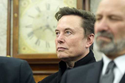 Elon Musk listens as President Donald Trump meets with India's Prime Minister Narendra Modi in the …