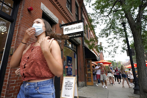 The Latest: Famed nightclub offers free COVID-19 jabs