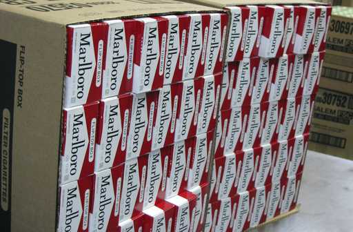 This July 29, 2013, photo shows a case of freshly-stamped Marlboro cigarette cartons at M