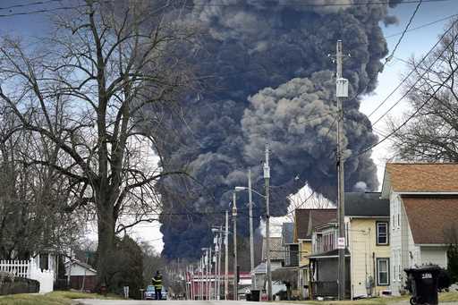 A black plume rises over East Palestine, Ohio, as a result of a controlled detonation of a portion …