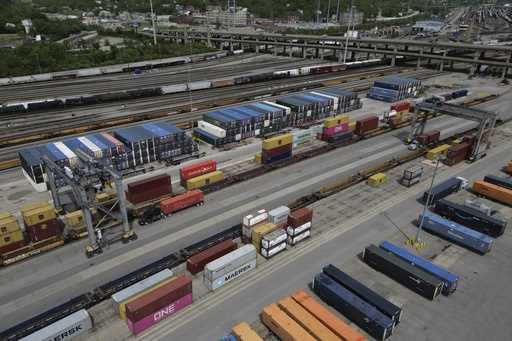 Shipping containers are loaded onto trucks at CSX Intermodal Terminals, a supplier of rail-based fr…