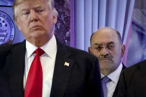 Allen Weisselberg, right, stands behind then President-elect Donald Trump during a news conference …