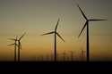 Wind turbines stretch across the horizon at dusk at the Spearville Wind Farm, Sept