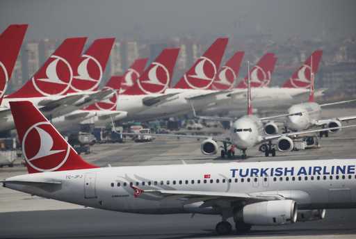 Turkish Airlines airplanes are parked at Ataturk International Airport, in Istanbul, Friday, April …