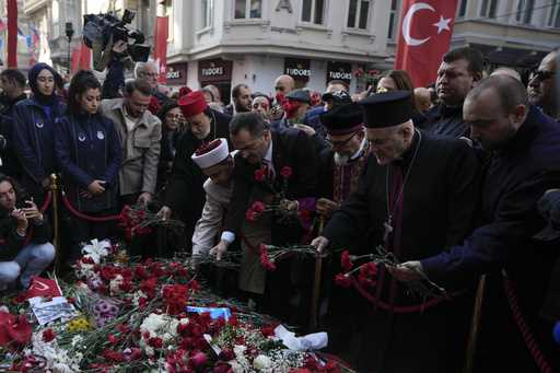 Representatives of the Turkish communities put flowers over a memorial placed on the spot of Sunday…