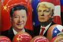 Traditional Russian wooden dolls called Matryoshka depicting China's President Xi Jinping and Presi…