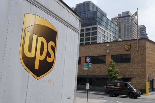 A delivery vehicle passes by a UPS depot, Thursday, June 29, 2023, in New York