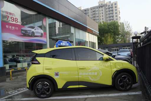 A Seagull electric vehicle from Chinese automaker BYD for test driving is parked outside a showroom…