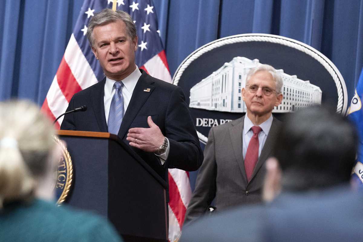 Merrick Garland, Christopher Wray