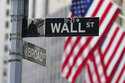 A street sign is seen in front of the New York Stock Exchange in New York, Tuesday, June 14, 2022