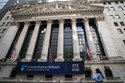 US stocks end mixed after another day of erratic trading