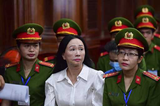 Business woman Truong My Lan, front center, attends a trial in Ho Chi Minh City, Vietnam on Thursda…