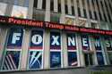 A headline about President Donald Trump is displayed outside Fox News studios in New York on Novemb…
