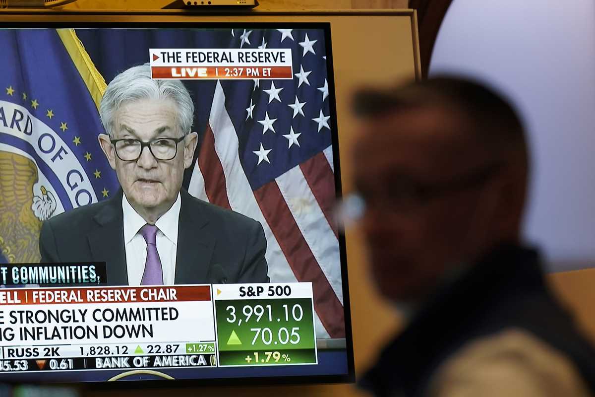 Wall Street points down after rate hike, ahead of GDP report
