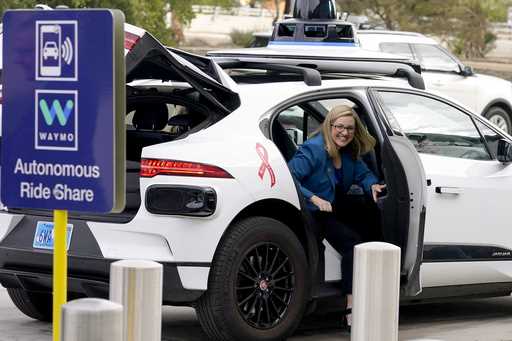 Phoenix Mayor Kate Gallego arrives in a Waymo self-driving vehicle on December 16, 2022, at the Sky…