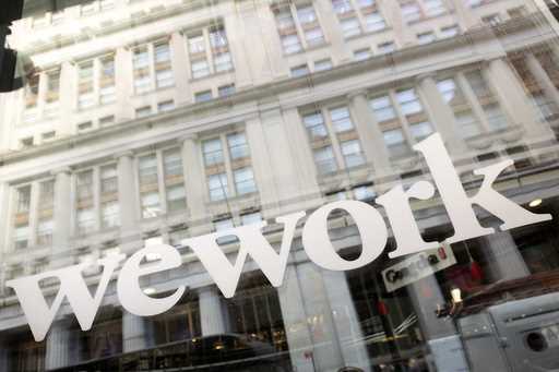 The WeWork logo is seen at one of the company's offices, January 16, 2020, in New York