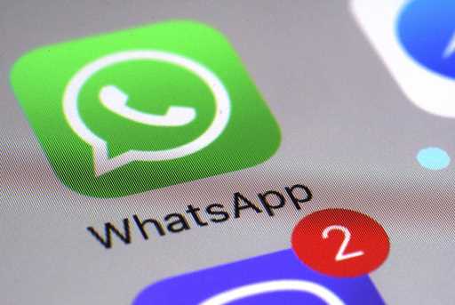 The WhatsApp communications app is seen on a smartphone, in New York, March 10, 2017