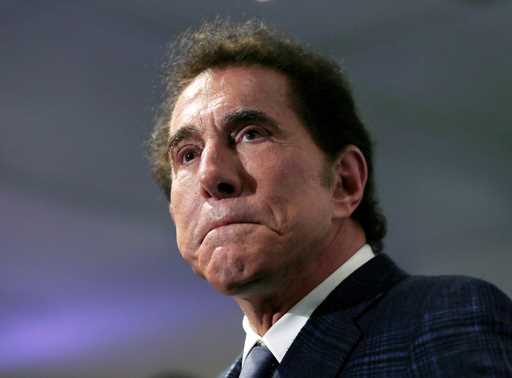 Casino mogul Steve Wynn pauses at a news conference in Medford, Mass