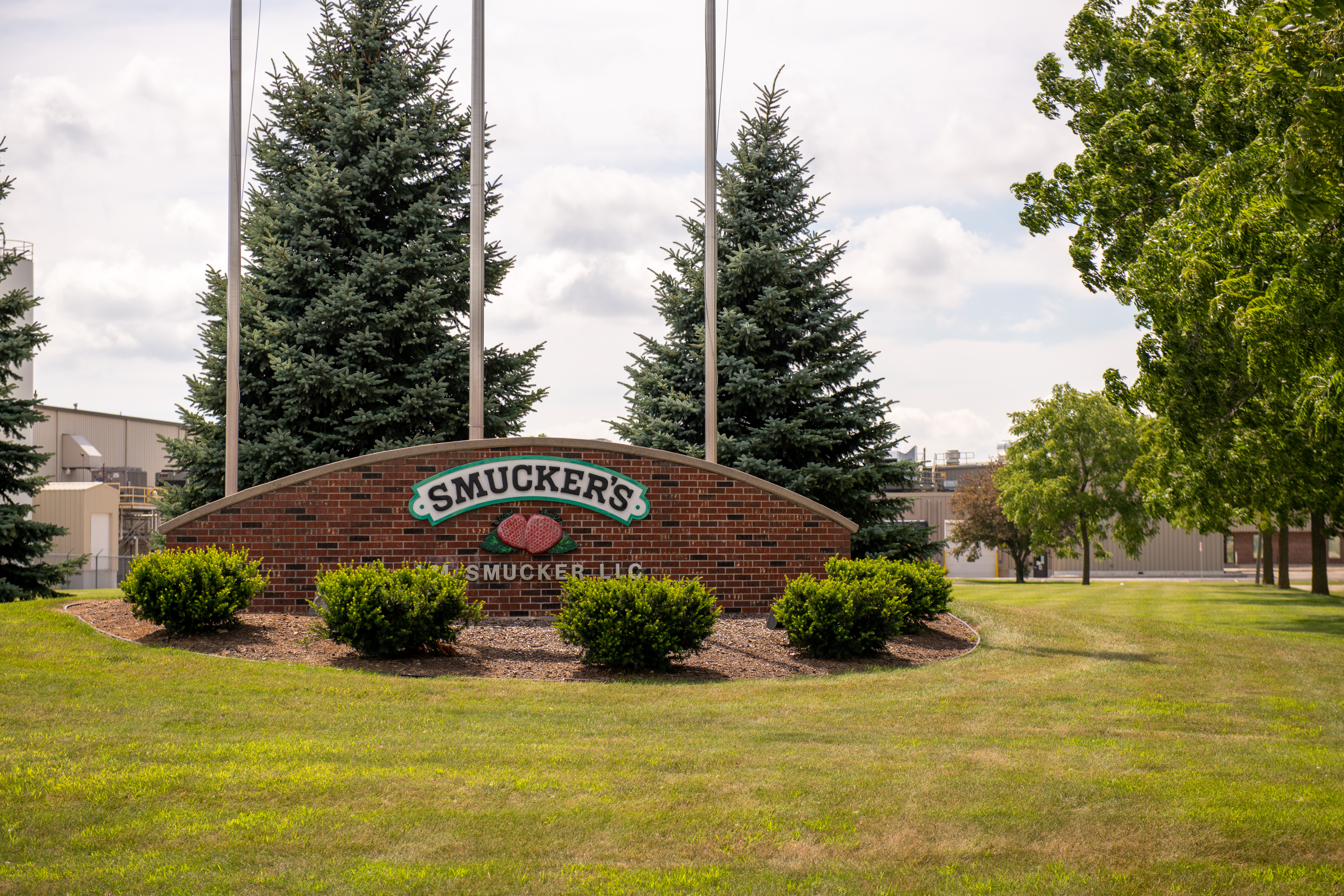 Smucker logo in front of building