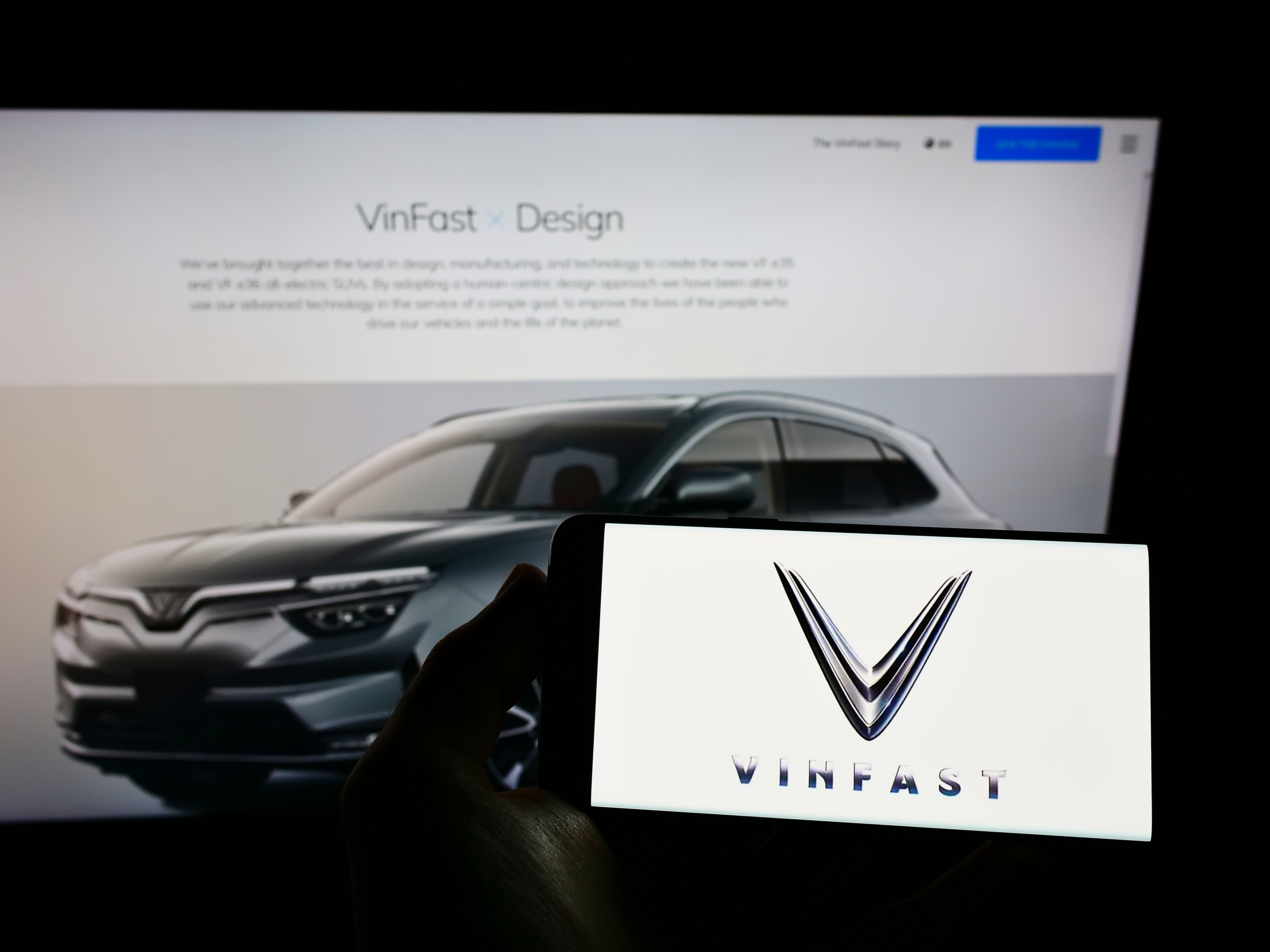 image of vinfast logo and vinfast ev on web page