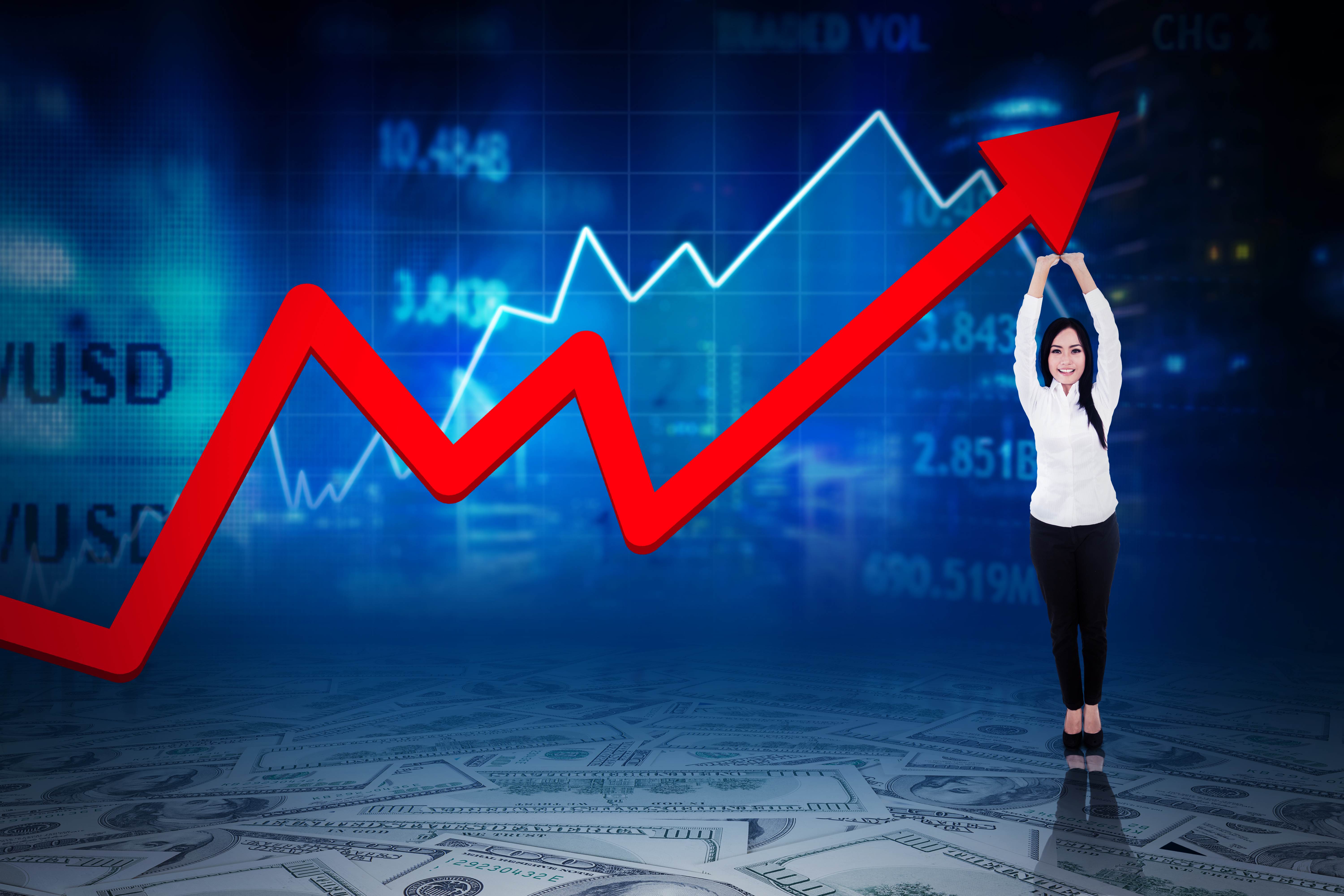 woman lifting red arrow showing stock price growth