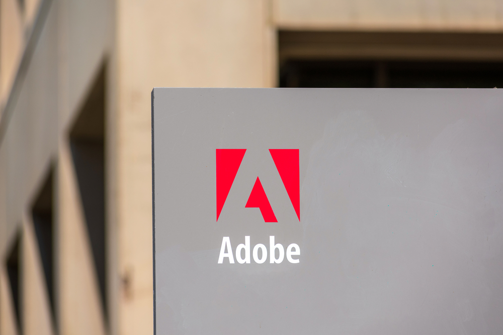 Adobe logo on signpost at Adobe Inc headquarters