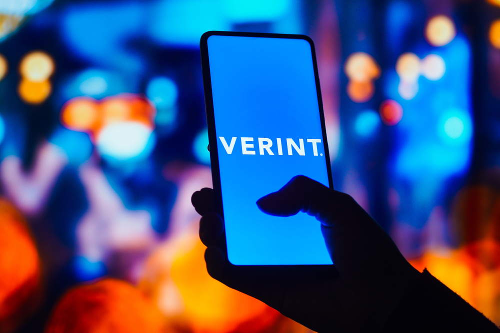 Verint Systems logo is displayed on a smartphone screen