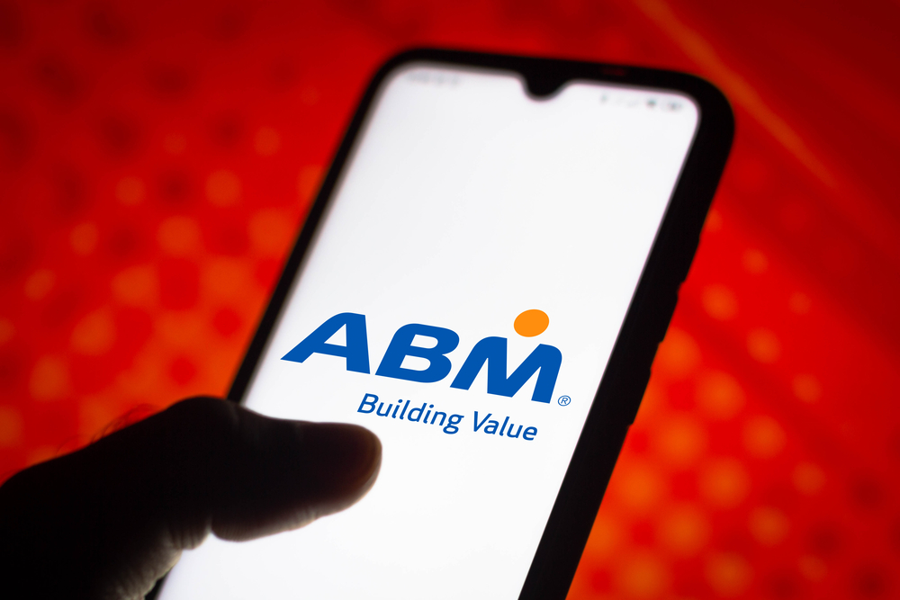 ABM Industries logo seen displayed on a smartphone