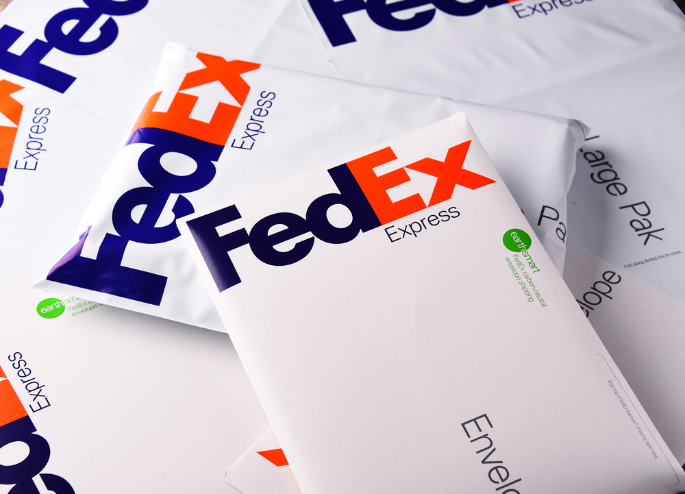 pile of FedEx packages