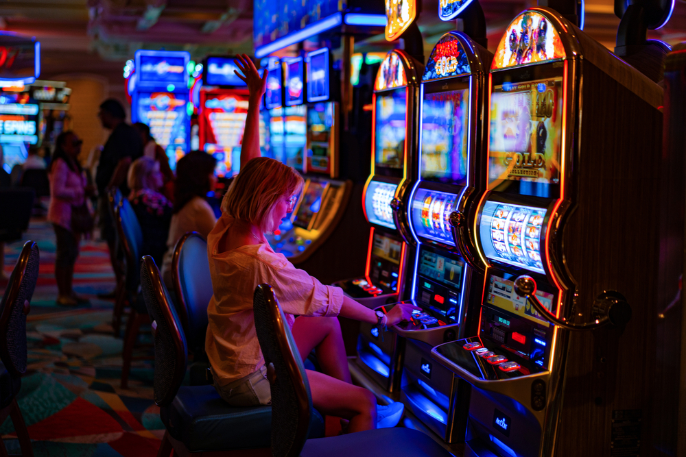 girl in a casino in Las Vegas, the woman plays for the slot machine