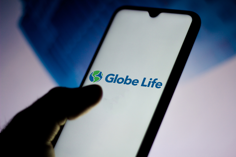  In this photo illustration the Globe Life logo seen displayed on a smartphone