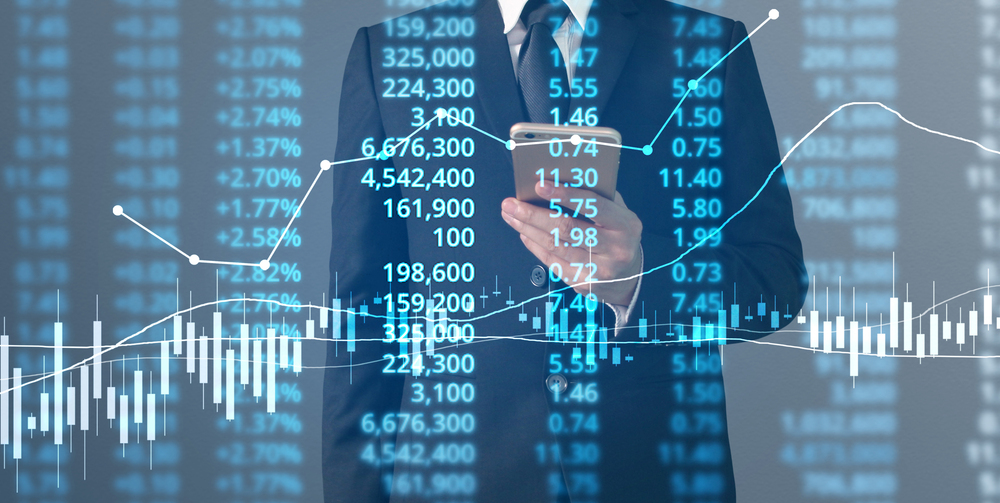  Businessman plan graph growth and increase of chart positive indicators in his business