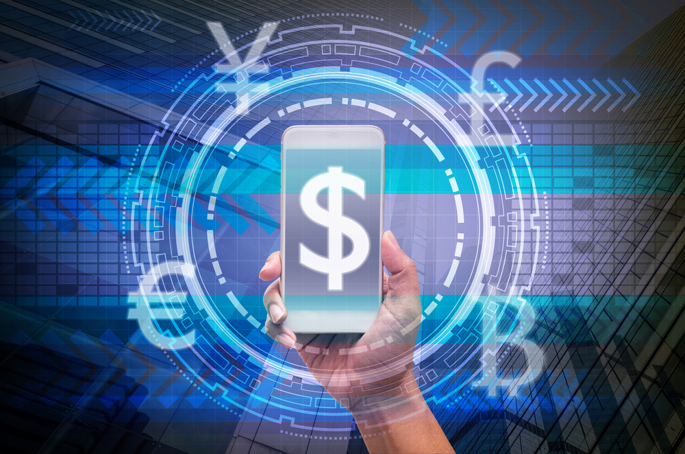 holding smart phone showing the financial technology