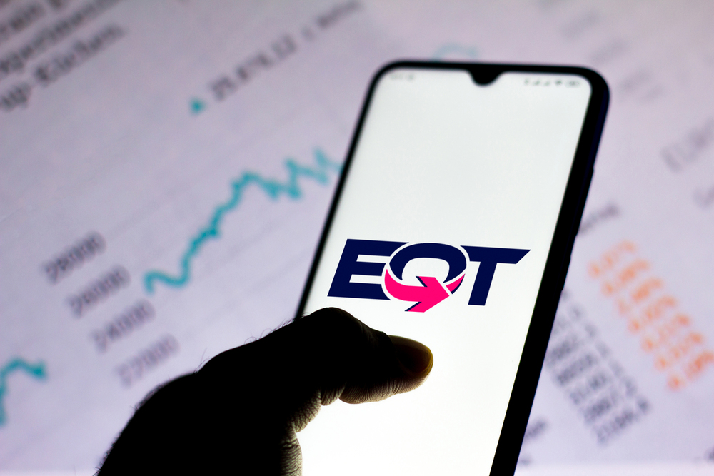 In this photo illustration the EQT Corporation logo seen displayed on a smartphone