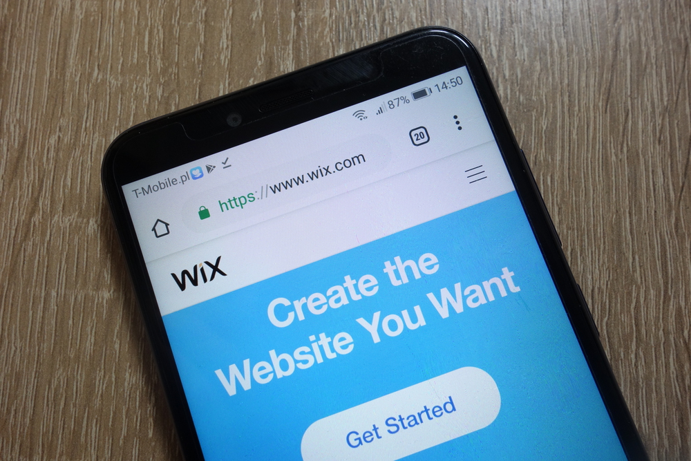Wix website (www.wix.com) displayed on smartphone