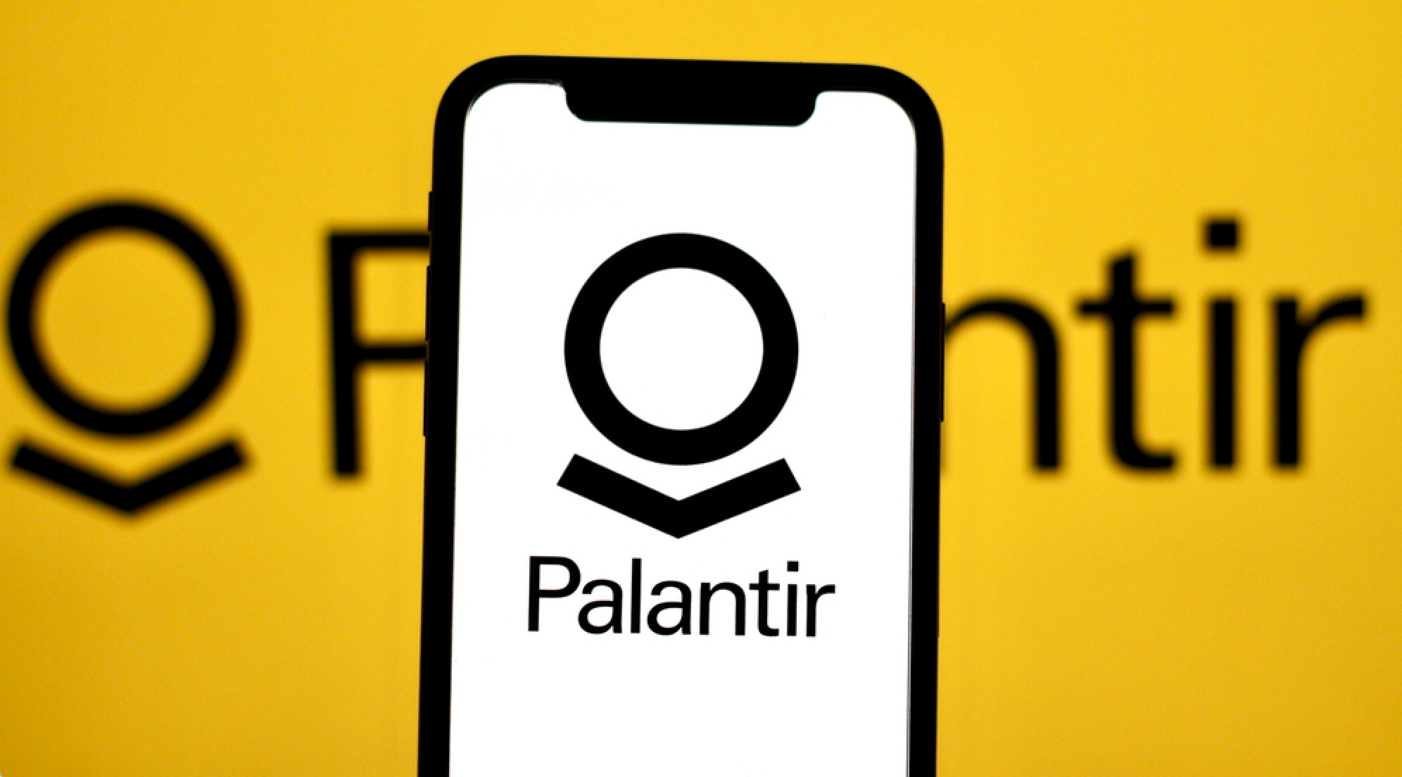 palantir logo on smartphone yellow background