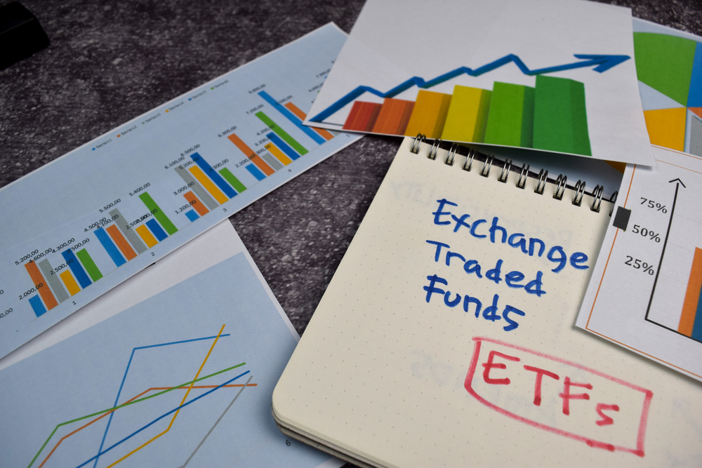 ETFs write on a book isolated on Office Desk. Stock market concept