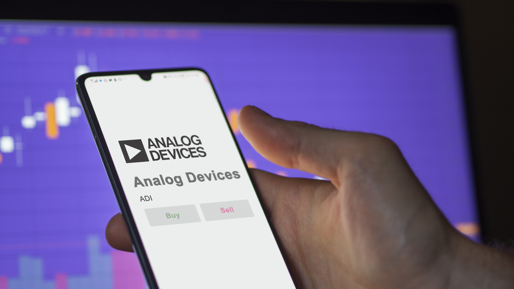 April 04th 2024. The logo of Analog Devices on the screen of an exchange. Analog Devices price stocks, $ADI on a device. — Stock Editorial Photography