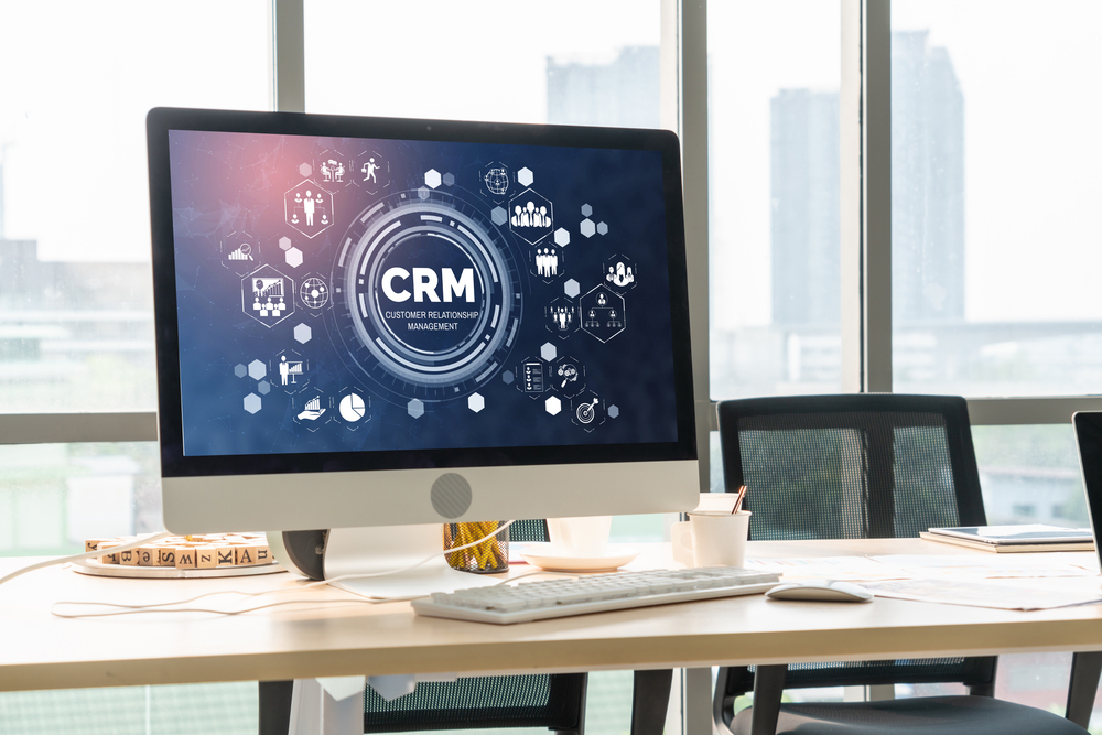 Customer relationship management system on modish computer for CRM business and enterprise - stock image