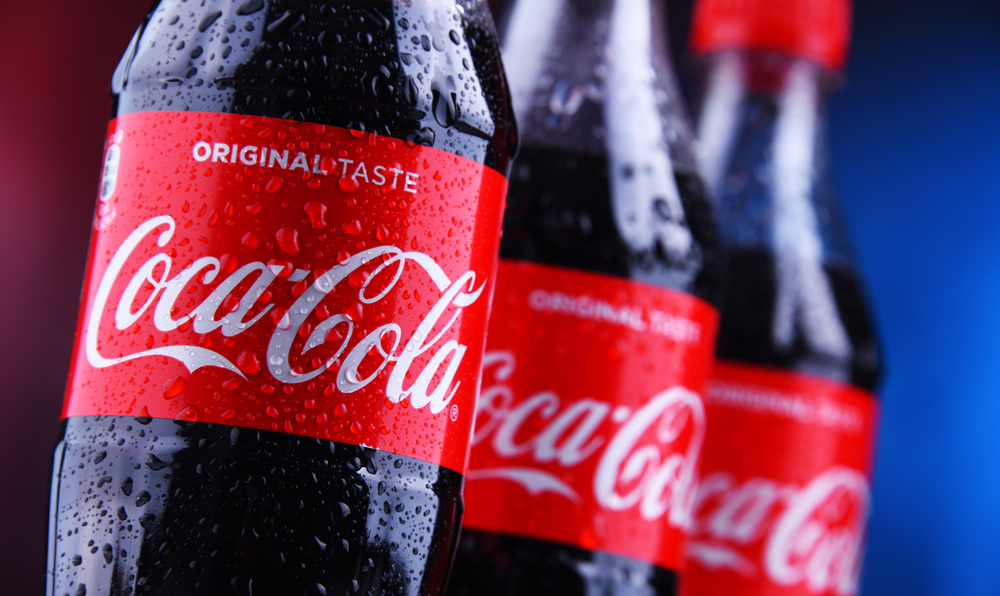 POZNAN, POLAND - NOV 29, 2018: Plastic bottles of Coca-Cola, a carbonated soft drink manufactured by The Coca-Cola Company headquartered in Atlanta, Georgia, USA - Stock Editorial Photography