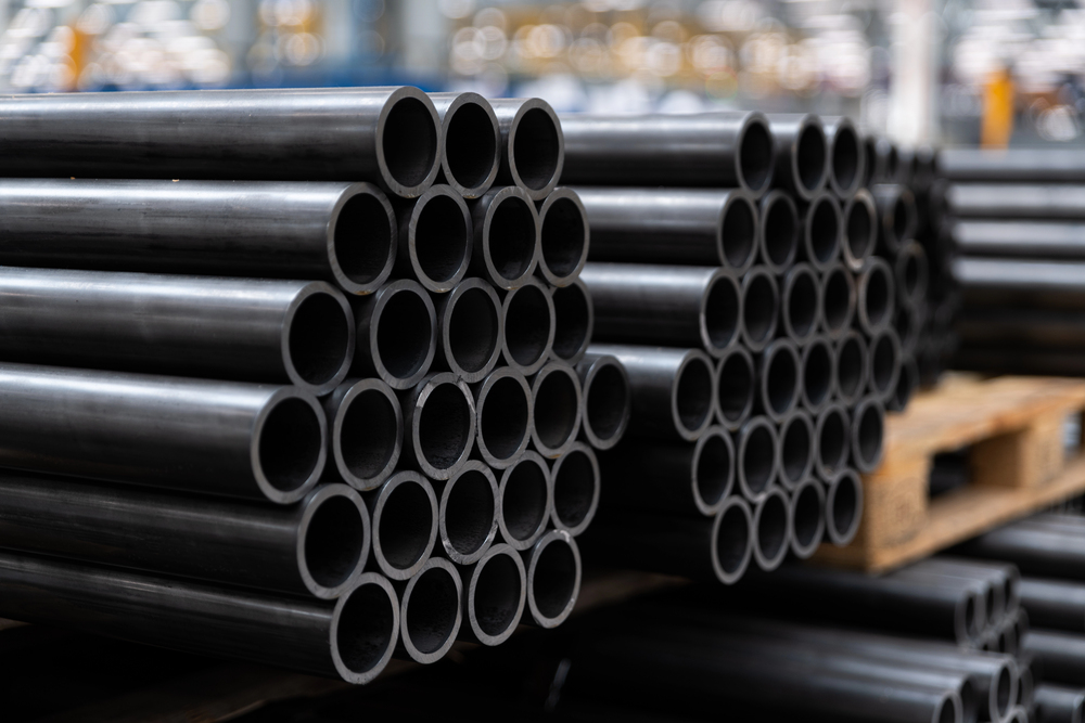 Black steel pipes on the stack — Photo