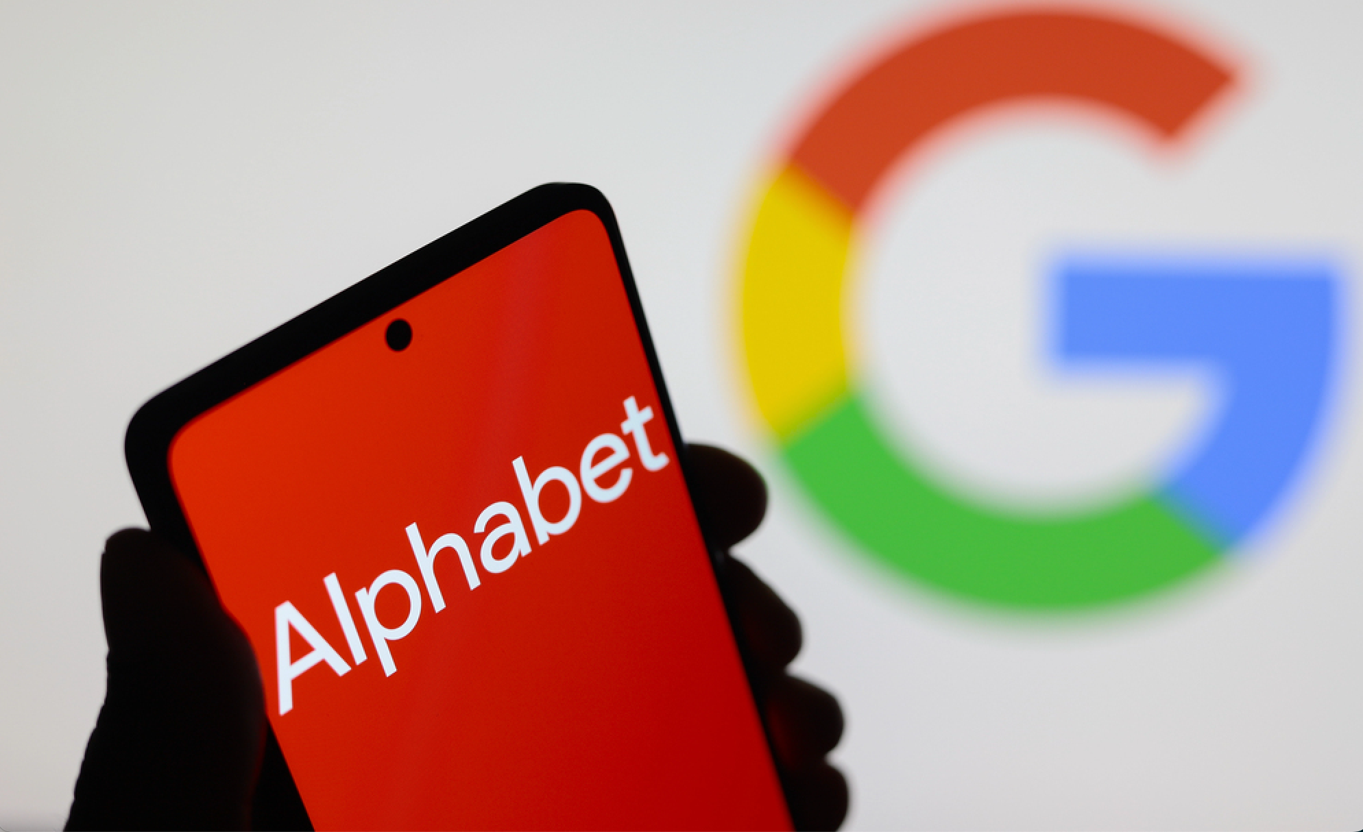 July 24, 2024, Paraguay. In this photo illustration, the Alphabet Inc. logo seen displayed on a smartphone screen and the Google logo in the background — Stock Editorial Photography