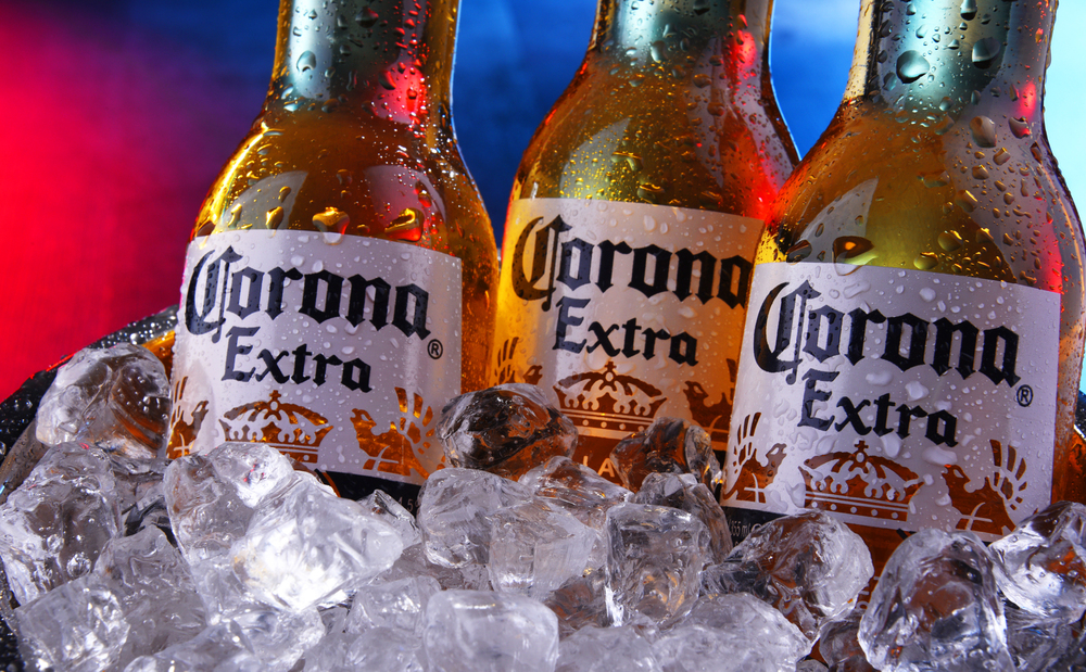 Bottles of Corona Extra beer in the bucket with crushed ice — Stock Editorial Photography